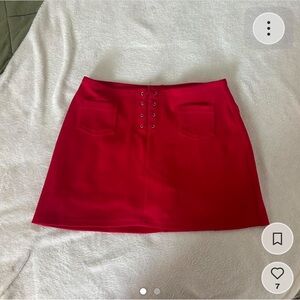 red mini skort w/ tie in the front and mini pockets